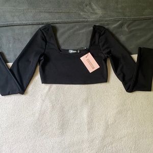 Black cropped long sleeve top from Missguided. Size US 2, EU 34, UK 6, AUS 6